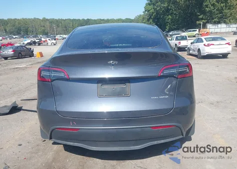 2023 Tesla Model Y Awd/Long Range Dual Motor All-Wheel Drive z USA, uszkodzony, nr VIN 7SAYGDEE2PF791592